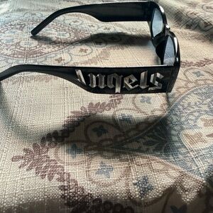 Black Sunglasses with Bold Lettering